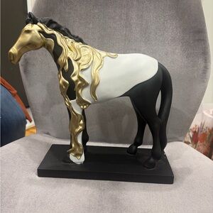 Elegant Black and Gold Horse Sculpture